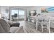 Living room with ocean view and comfy seating at 2700 Ocean Shore Blvd # 317, Ormond Beach, FL 32176