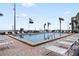 Community pool with lounge chairs and ocean view at 2700 Ocean Shore Blvd # 317, Ormond Beach, FL 32176