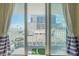 Private balcony with ocean view and seating for two at 2800 N Atlantic Ave # 212, Daytona Beach, FL 32118