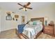 Bright bedroom with a comfortable bed and built-in storage at 2800 N Atlantic Ave # 212, Daytona Beach, FL 32118
