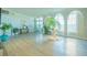 Building lobby with elegant flooring and plenty of plants at 2800 N Atlantic Ave # 212, Daytona Beach, FL 32118