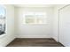 Empty bedroom with vinyl flooring and a double window at 3263 S Peninsula Dr, Daytona Beach, FL 32118