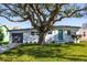Newly renovated home with a modern facade and spacious lawn at 3263 S Peninsula Dr, Daytona Beach, FL 32118