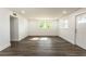 Spacious living area with hardwood floors and natural light at 3263 S Peninsula Dr, Daytona Beach, FL 32118