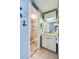 Clean bathroom with marble shower and nautical decor at 3501 S Atlantic Ave # 2030, Daytona Beach, FL 32118