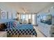 Nautically-themed bedroom with a large bed and ocean views at 3501 S Atlantic Ave # 2030, Daytona Beach, FL 32118
