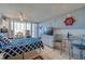 Bedroom with a queen bed, dresser, and ocean view at 3501 S Atlantic Ave # 2030, Daytona Beach, FL 32118