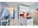 Small galley kitchen with red appliances and nautical theme at 3501 S Atlantic Ave # 2030, Daytona Beach, FL 32118