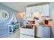 Small kitchen with red appliances and nautical decor at 3501 S Atlantic Ave # 2030, Daytona Beach, FL 32118