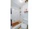 Marble shower with a shower caddy and nautical decor at 3501 S Atlantic Ave # 2030, Daytona Beach, FL 32118