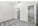 Bedroom with grey carpet and double door closet at 553 Coronado Cove Rd, New Smyrna Beach, FL 32168