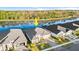 Aerial view of house near a lake at 588 Mosaic Blvd, Daytona Beach, FL 32124