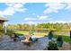 Relaxing patio with lake view, perfect for outdoor enjoyment at 588 Mosaic Blvd, Daytona Beach, FL 32124