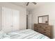 Bright bedroom with a queen-size bed and a large closet at 588 Mosaic Blvd, Daytona Beach, FL 32124