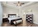 King-size bed, hardwood floors, and an ensuite bathroom with a relaxing bathtub at 588 Mosaic Blvd, Daytona Beach, FL 32124