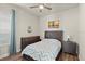 Guest bedroom with wood floors and a comfortable bed at 588 Mosaic Blvd, Daytona Beach, FL 32124