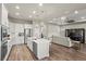 Open concept kitchen with island and living area view at 588 Mosaic Blvd, Daytona Beach, FL 32124