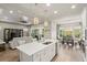Open concept kitchen with large island and breakfast bar at 588 Mosaic Blvd, Daytona Beach, FL 32124