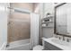 Clean bathroom with tub, shower, and modern vanity at 628 Mosaic Blvd, Daytona Beach, FL 32124