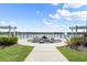 Fire pit area with comfortable seating by the lake at 628 Mosaic Blvd, Daytona Beach, FL 32124