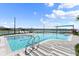 Resort-style pool with lounge chairs and a shaded area at 628 Mosaic Blvd, Daytona Beach, FL 32124