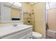 Clean bathroom with white vanity, toilet, and shower/tub combo at 633 S Palmetto Ave # 1010, Daytona Beach, FL 32114