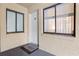 Condo entry with white door and welcome mat at 633 S Palmetto Ave # 1010, Daytona Beach, FL 32114