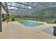 Enjoy this refreshing pool with a screened enclosure, providing shade and privacy at 955 N Ridgewood Ave, Deland, FL 32720