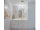 Bathroom with vanity, storage, and a beachy theme at 3 Oceans West Blvd # 4A5, Daytona Beach Shores, FL 32118