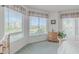 Spacious bedroom with large windows and golf course view at 3 Oceans West Blvd # 4A5, Daytona Beach Shores, FL 32118