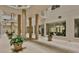Inviting building courtyard with lush greenery and seating areas at 3 Oceans West Blvd # 4A5, Daytona Beach Shores, FL 32118