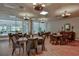 Bright community room featuring tables and chairs at 3 Oceans West Blvd # 4A5, Daytona Beach Shores, FL 32118