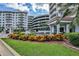 Luxury condo building with parking and landscaping at 3 Oceans West Blvd # 4A5, Daytona Beach Shores, FL 32118