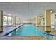 Inviting indoor pool with separate hot tub area at 3 Oceans West Blvd # 4A5, Daytona Beach Shores, FL 32118