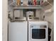 Convenient laundry closet with washer and dryer at 3 Oceans West Blvd # 4A5, Daytona Beach Shores, FL 32118
