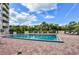 Refreshing outdoor pool with ample lounge chairs at 3 Oceans West Blvd # 4A5, Daytona Beach Shores, FL 32118