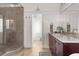 Elegant bathroom with a large soaking tub, double vanity, and walk-in shower at 3765 John Anderson Dr, Ormond Beach, FL 32176