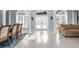 Bright living room with high ceilings, neutral walls, and large windows at 3765 John Anderson Dr, Ormond Beach, FL 32176