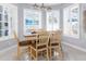 Bright breakfast nook with built-in seating and window at 3765 John Anderson Dr, Ormond Beach, FL 32176