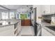 Modern kitchen island with granite countertops and stainless steel appliances at 3765 John Anderson Dr, Ormond Beach, FL 32176