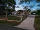 Elegant two-story home with gated entrance and landscaping at 3765 John Anderson Dr, Ormond Beach, FL 32176
