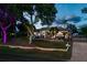Spacious home with gated entry and beautifully lit landscaping at 3765 John Anderson Dr, Ormond Beach, FL 32176