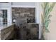 Complete outdoor kitchen with grill and granite countertops at 3765 John Anderson Dr, Ormond Beach, FL 32176