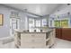 Large kitchen with granite countertops and white cabinets at 3765 John Anderson Dr, Ormond Beach, FL 32176