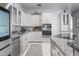 Well-equipped kitchen with stainless steel appliances and granite countertops at 3765 John Anderson Dr, Ormond Beach, FL 32176
