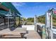 Private boat lift with covered storage and spacious wooden deck at 3765 John Anderson Dr, Ormond Beach, FL 32176