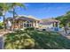 Luxury home with stone exterior and lush landscaping at 3765 John Anderson Dr, Ormond Beach, FL 32176