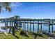 Private wooden dock with covered boat lift at 3765 John Anderson Dr, Ormond Beach, FL 32176