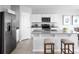 Modern kitchen with stainless steel appliances and granite countertops at 1235 Tank Trl, Haines City, FL 33844