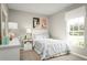 Bright bedroom with llama-themed bedding and decor at 1235 Tank Trl, Haines City, FL 33844